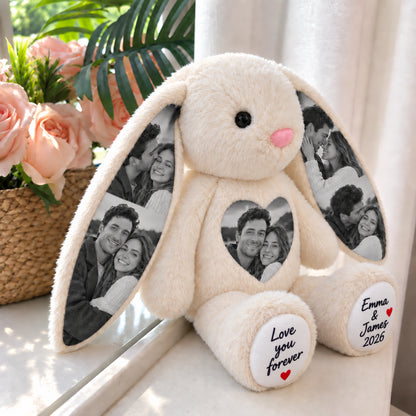 Side view of a white personalized photo bunny beside a window and flower basket.