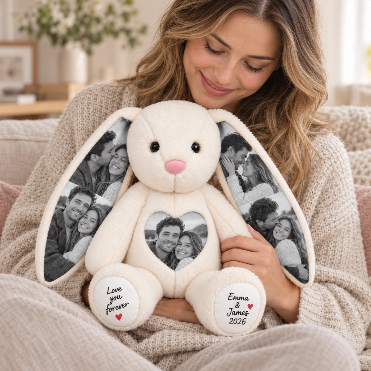 Woman holding a white personalized bunny with couple photos on its ears and heart and custom words on both paws.