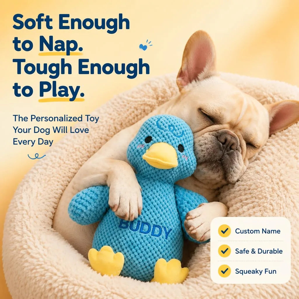 Dog cuddling with a soft personalized duck dog toy